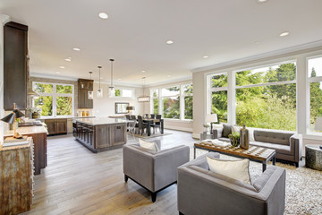 Fototapeta na wymiar Luxurious new construction with open plan interior. Luxury American modern home.