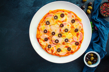 pizza sausage salami, olives and cheese. Menu concept food background. top view. copy space for text