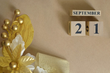September 21, Vintage natural calendar design with number cube.
