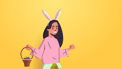 woman wearing bunny ears cute girl holding basket with eggs celebrating happy easter holiday horizontal portrait vector illustration