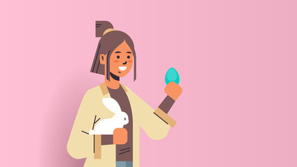 attractive woman holding rabbit and egg smiling girl celebrating happy easter holiday horizontal portrait vector illustration