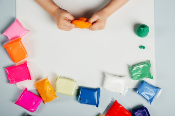 Baby makes air plasticine. look with top. Development of small matorica in babies.