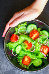  Healthy salad, leaves mix salad (mix micro greens, cucumber, tomato, onion, other ingredients). food background. copy space for text