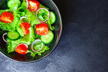  Healthy salad, leaves mix salad (mix micro greens, cucumber, tomato, onion, other ingredients). food background. copy space for text