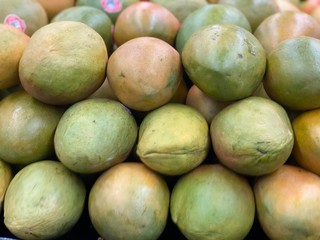 Mango organic foods. Mangoes on the super market shelf 