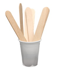 Medical throat inspection spatulas  in plastic disposable cup isolated on white background with clipping path