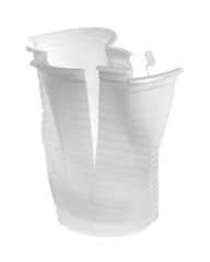 Disposable crumpled and thrown, damaged plastic cup  for throwing away and recycling isolated on white background with clipping path