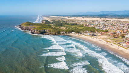 Torres - RS. Aerial view of Cal beach and cliffs from Guarita Park in Torres, Rio Grande do Sul, Brazil