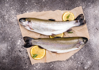 Raw uncooked trout with lemon