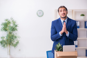 Young man being fired from his work