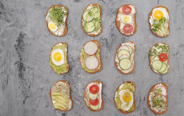Sandwiches with vegetables, eggs, avokado and micro greens. Healthy food.