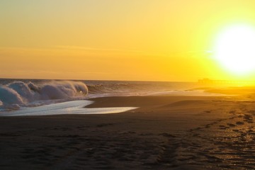 Scenic view of beach during sunrise