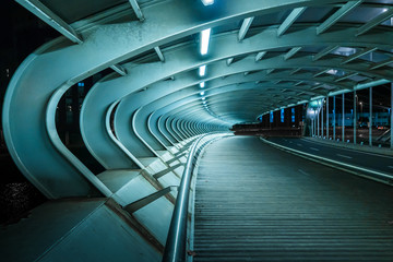 bridge with tubular structure, illuminated without people