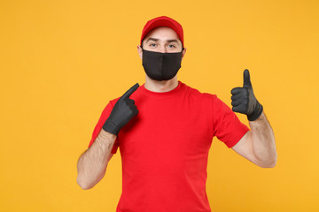 Delivery man in red cap blank t-shirt uniform sterile face mask gloves isolated on yellow...