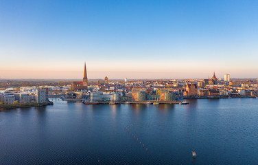 sunrise over the city of rostock, germany