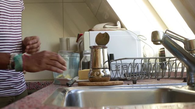 Person making bulletproof coffee in the morning