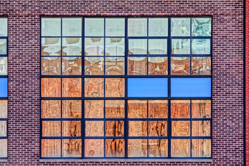 Industrial red brick facade in west side of Manhattan in New York.