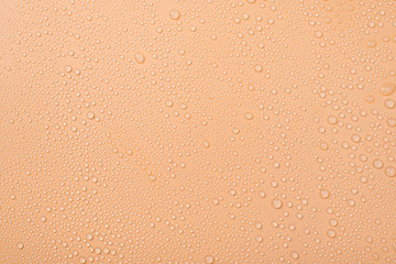 Top above overhead view photo of little drops of water on beige background