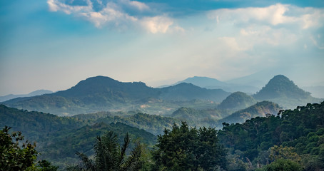 Beautiful hills covered in haze because of forest fires spotted in rural West Java, Indonesia