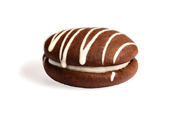 One chocolate whoopie pie with marshmallow filling isolated on white background.