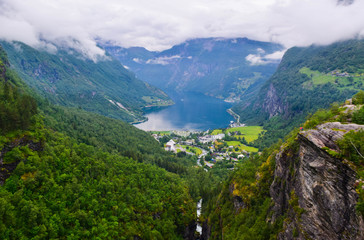 Fototapeta na wymiar The landscape of Geiranger small village which is located at the end of the Geirangerfjord and where the Geirangelva river empties into it.