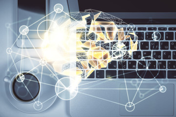 Double exposure of brain drawing hologram over topview work table background with computer. Concept of big data.