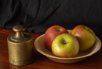 antique weight and tasty apples