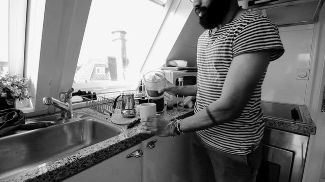 Person making bulletproof coffee in the morning