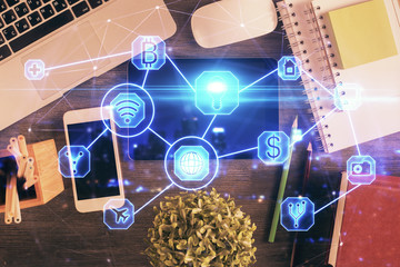 Double exposure of social network theme drawing over table with phone. Top view. People connecting concept.