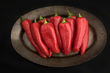 Overview of red peppers on a platter.