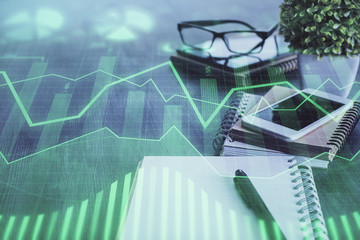 Double exposure of forex chart drawing and cell phone background. Concept of financial trading