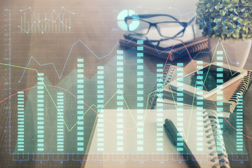 Double exposure of forex chart drawing and cell phone background. Concept of financial trading