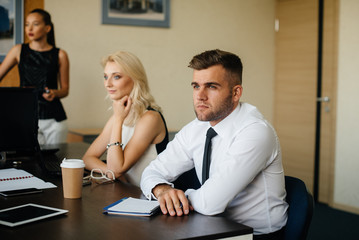 Obraz premium An employee sits during a meeting in the Business, Finance team