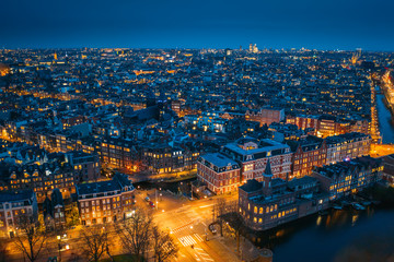 Fototapeta na wymiar Amsterdam night city skyline aerial view from above, Amsterdam, Netherlands.