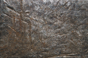 Anvil surface with scratches and traces from hammer. rough steel background