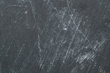 Carbon stone gray texture. scratched surface. geological background