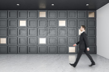 Businessman walking in room