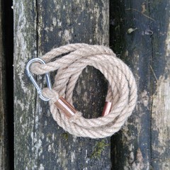 cord leash on a wooden bench