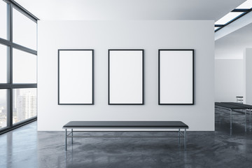 Contemporary exhibition hall room with three empty banners