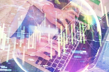 Double exposure of woman hands typing on computer and business theme hologram drawing. Success concept.