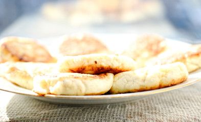 curd pancake on a white plate.