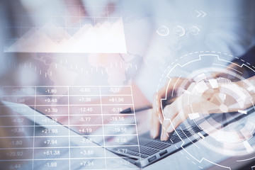 Double exposure of woman hands typing on computer and forex chart hologram drawing. Stock market invest concept.
