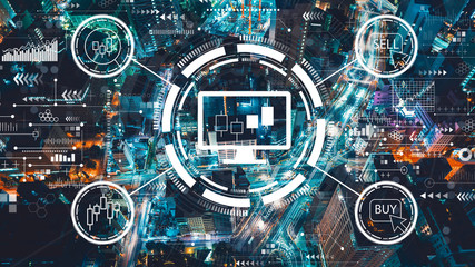 Stock trading theme with aerial view of Tokyo, Japan at night