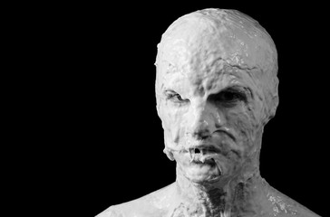 portrait of a shapeless distorted face on a black background