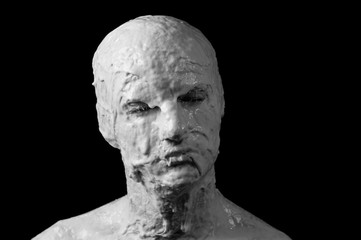 portrait of a shapeless distorted face on a black background