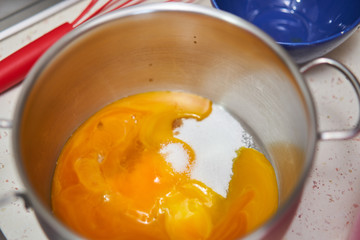 Egg yolks and sugar in a pot
