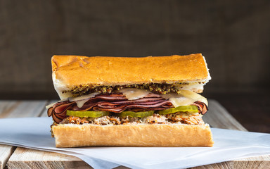 Hot melted ham pickle and cheese sandwich