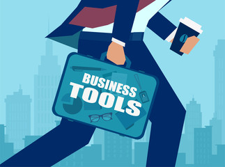 Vector of a busy business man with a tools briefcase