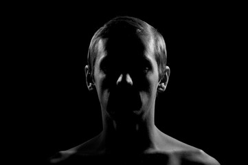black and white dramatic portrait of a guy