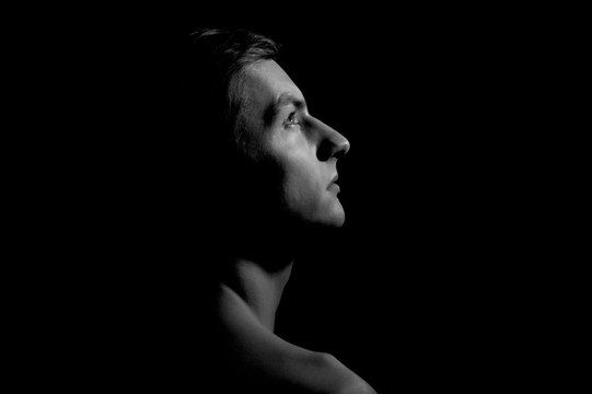 black and white dramatic portrait of a guy